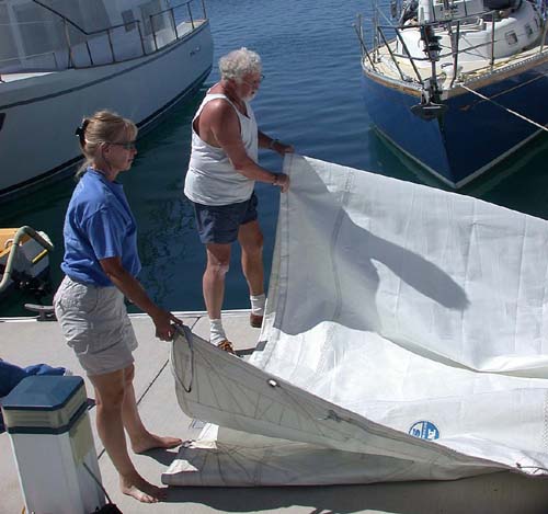 Anne and Gunter Fold the Sails