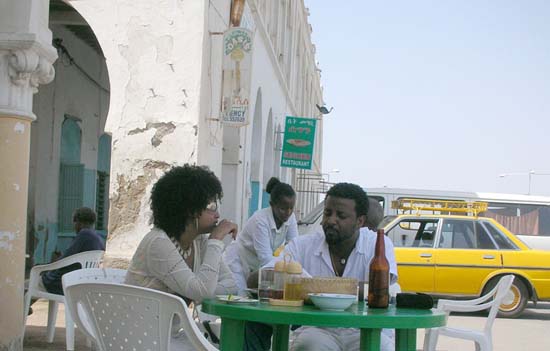 22 Couple having restaurant meal in Massawa port area