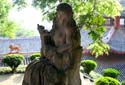 6 Statue of woman suckling animal
