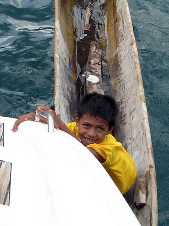 07 Indonesian Boy in Canoe at Swim Steps