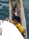 07 Indonesian Boy in Canoe at Swim Steps