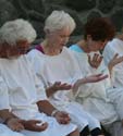 39 Israel, Jordan River near Galilee. Praying before baptism.