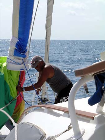 07 Noen Pulls Down Spinnaker Sock