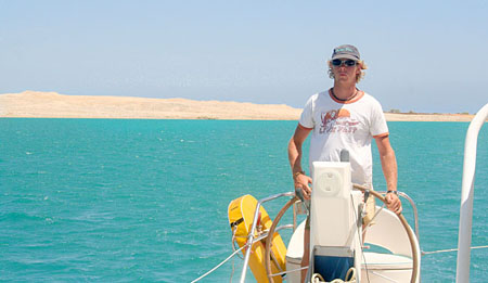 02 Chris at the helm, entering Suakin, Sudan