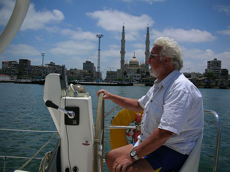 02 Gunter at helm, Port Suez, Egypt