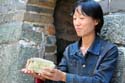 40 Happy Vendor Counts Money from Selling Cold Beer on the Great Wall