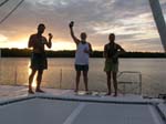 The crew toasts to our arrival at dusk, Escape R