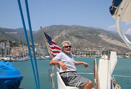 23 Joe at helm approaching Finike, Turkey