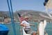 23 Joe at helm approaching Finike, Turkey