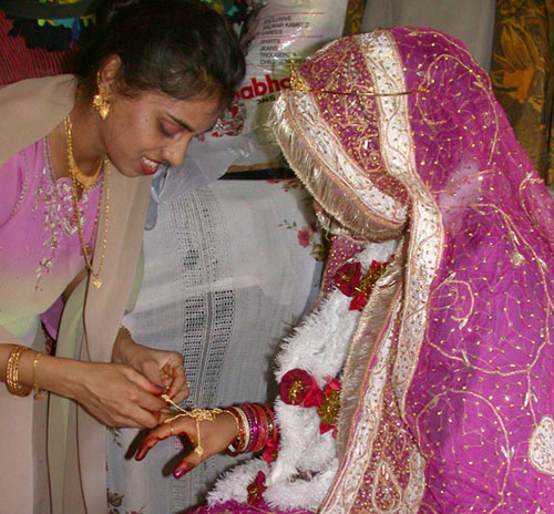 DSCN2045PuttingonHandJewelr