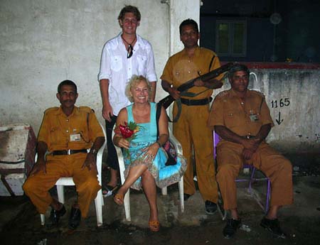07 Lois and Chris with guards at gate
